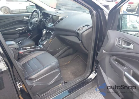 2014 Ford Escape Titanium z USA, uszkodzony, nr VIN 1FMCU9JX3EUD12892